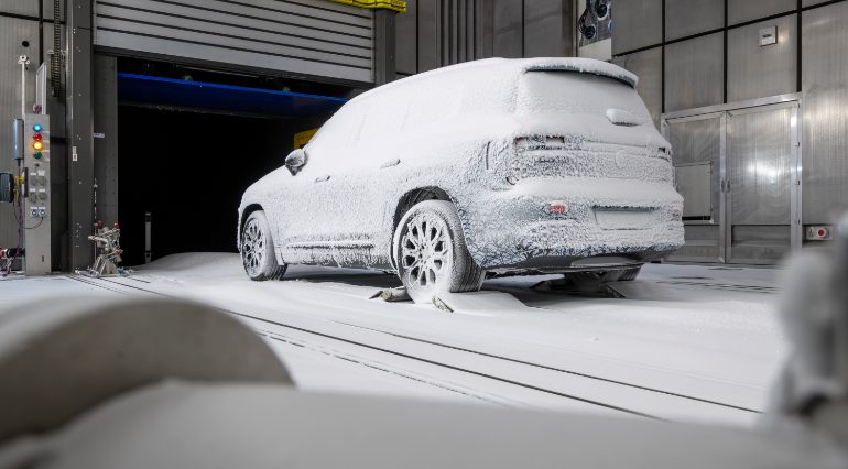 Mercedes GLB under snow rear angle