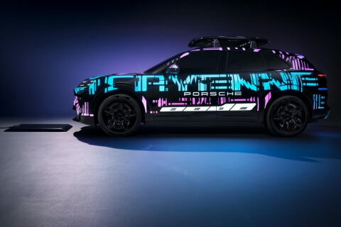 A Toyota Rav 4 drives down a snowy slope