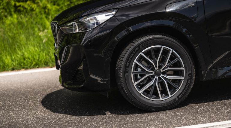Side profile of CrossClimate 3 tyre on black vehicle