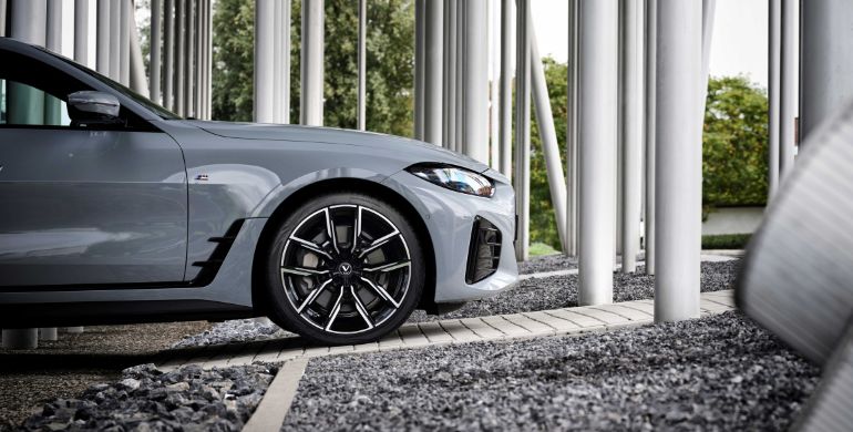 Side view of a grey vehicle with Vredestein tyres