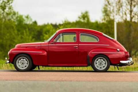 Red Volvo side angle
