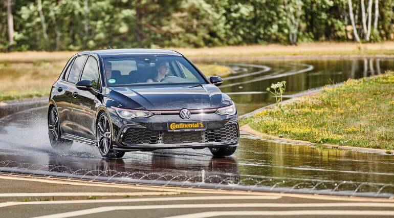 Golf GTI on a wet track