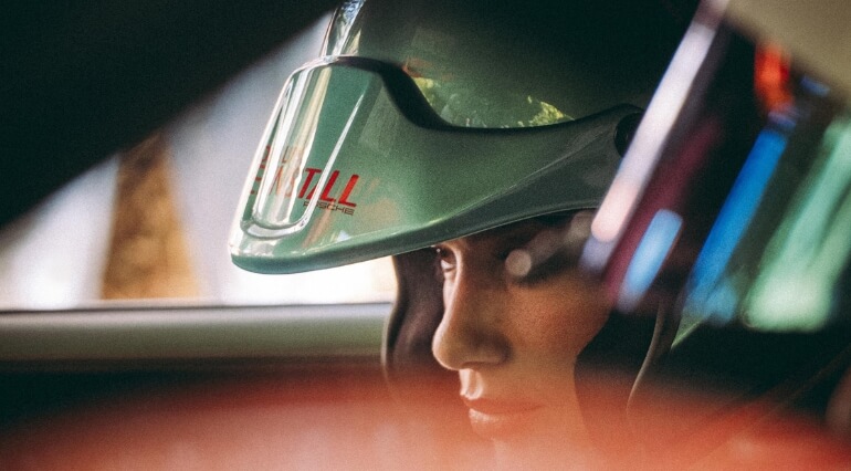 Dua Lipa in racing helmet