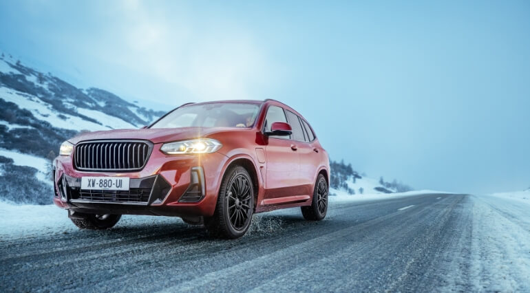 Generic red SUV on icy road