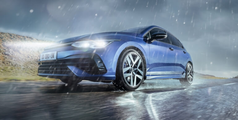 generic blue car in rain