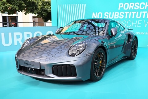 A white Fiat 500 Abarth as seen from above.