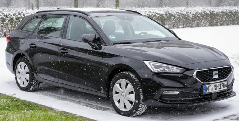 Black Seat Leon estate in snow