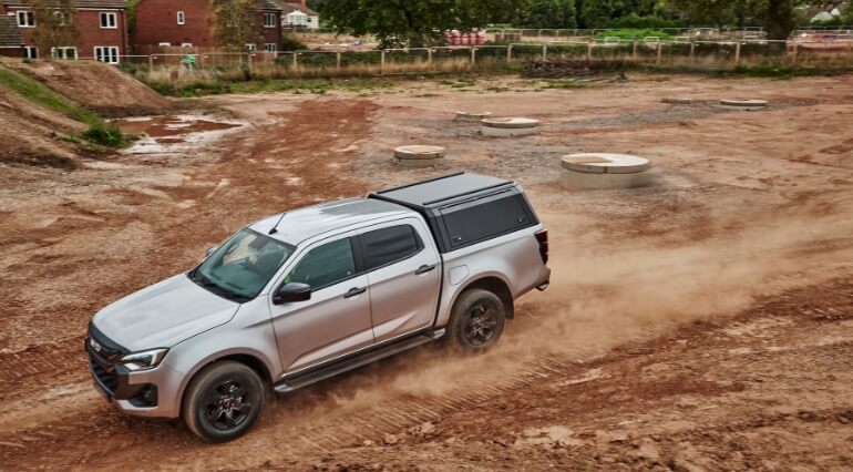 Isuzu D-Max driving on worksite