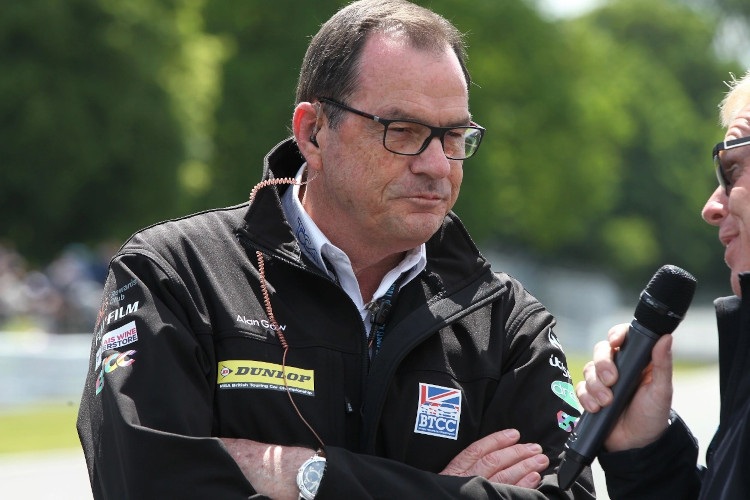 Alan Gow being interviewed by media