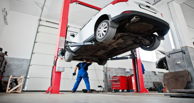 Passenger car being checked at a garage