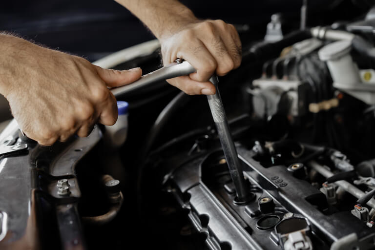 Spark plugs being installed