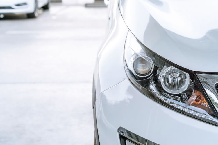 White car bonnet close up
