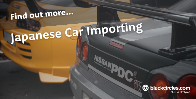 The rear of a Nissan GTR and a Toyota Supra