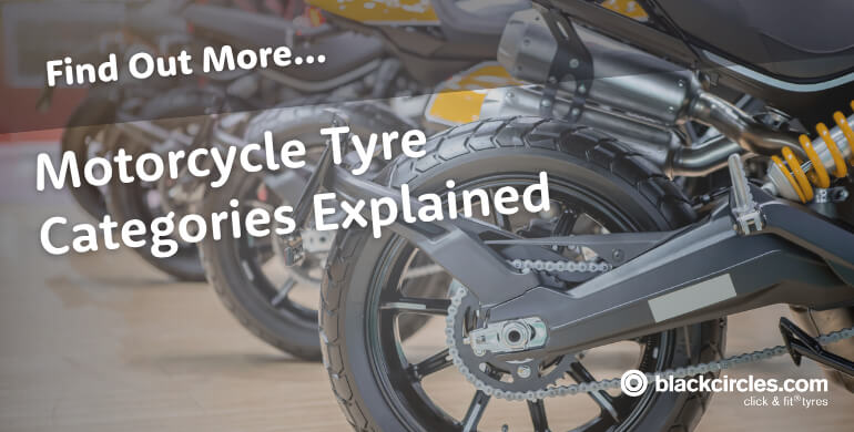 A row of motorcycle tyres showing sport, sport-touring, touring and adventure tread patterns